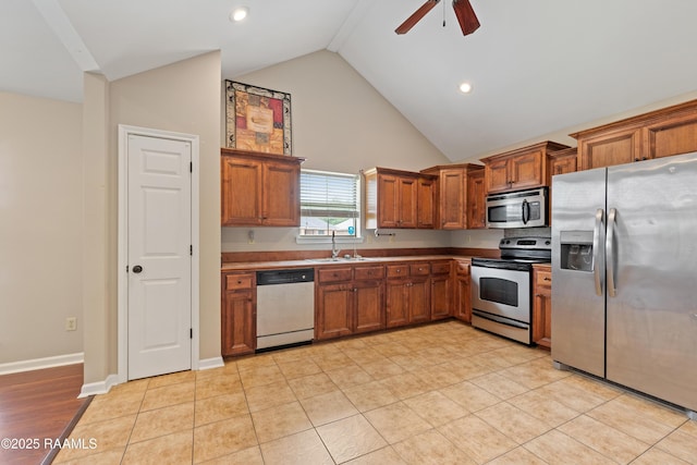 320 Golden Grain, Duson, LA 70529 - kitchen with stainless steel appliances, a sink, brown cabinets, a ceiling fan, and recessed lighting