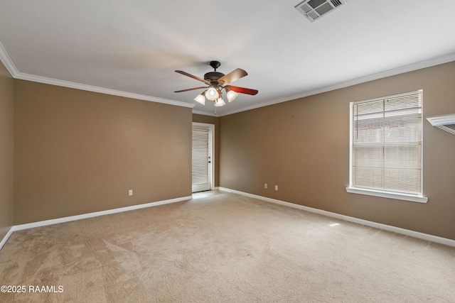 320 Golden Grain, Duson, LA 70529 - spare room with ceiling fan, baseboards, crown molding, and light colored carpet