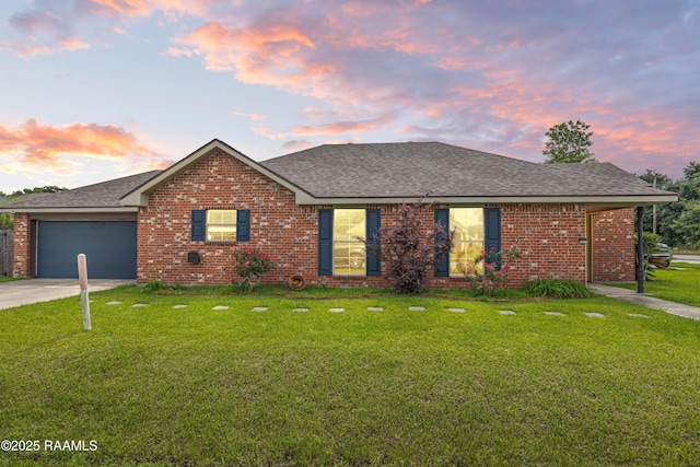 320 Golden Grain, Duson, LA 70529 - view of front facade with roof with shingles, brick siding, a garage, and driveway