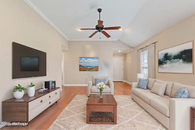 320 Golden Grain, Duson, LA 70529 - living area with a ceiling fan, wood finished floors, baseboards, crown molding, and lofted ceiling