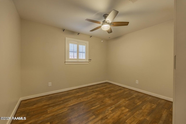 115 Hiawatha Rd, Lafayette, LA 70501 - empty room with a ceiling fan, dark wood-type flooring, and baseboards