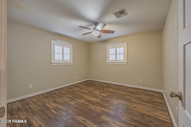 115 Hiawatha Rd, Lafayette, LA 70501 - empty room featuring plenty of natural light, ceiling fan, dark wood-style flooring, and baseboards