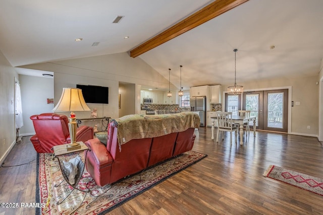 115 Hiawatha Rd, Lafayette, LA 70501 - living area with dark wood finished floors, baseboards, and a chandelier