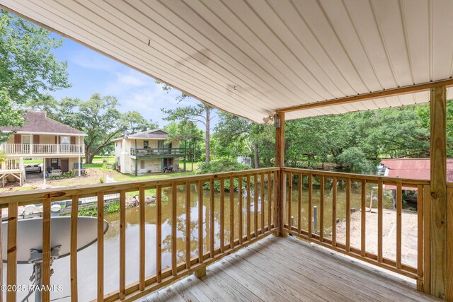 4802 Lafitte St, New Iberia, LA 70560 - wooden terrace with a water view