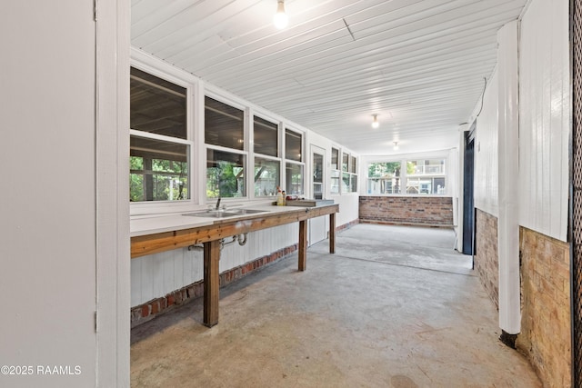 4802 Lafitte St, New Iberia, LA 70560 - unfurnished sunroom with concrete flooring and a sink