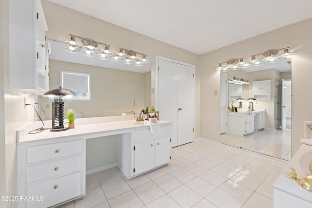4802 Lafitte St, New Iberia, LA 70560 - bathroom with two vanities and tile patterned flooring