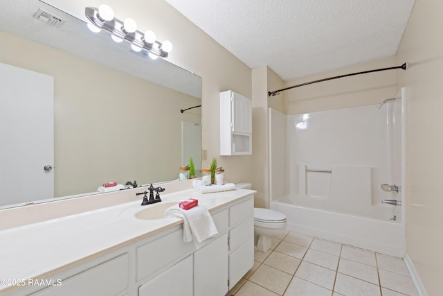 4802 Lafitte St, New Iberia, LA 70560 - full bath featuring tile patterned flooring, toilet, vanity, a textured ceiling, and shower / bath combination