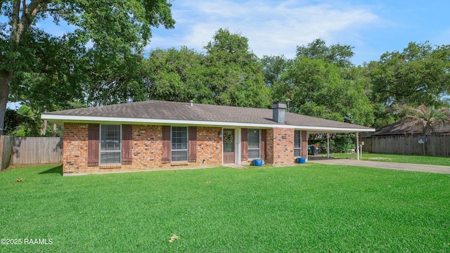 102 Lucas Cir, Lafayette, LA 70508 - ranch-style house with driveway, a carport, brick siding, and a chimney