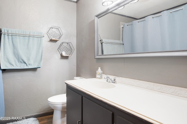 102 Lucas Cir, Lafayette, LA 70508 - full bathroom with vanity, toilet, and wood finished floors