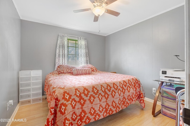 102 Lucas Cir, Lafayette, LA 70508 - bedroom featuring light wood-type flooring, a ceiling fan, and ornamental molding