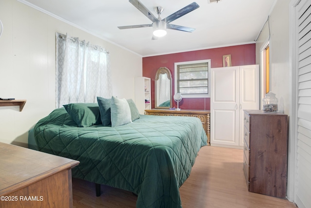 102 Lucas Cir, Lafayette, LA 70508 - bedroom with light wood-style floors, crown molding, and a ceiling fan