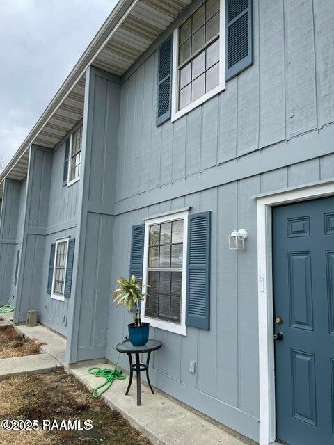 1500 Norman Bauer Dr, Franklin, LA 70538 - entrance to property with board and batten siding