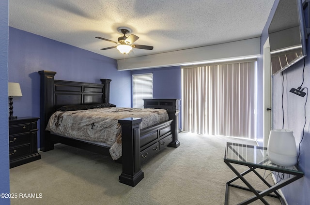 16 Heather Row, Lafayette, LA 70507 - bedroom with carpet, a textured ceiling, and a ceiling fan