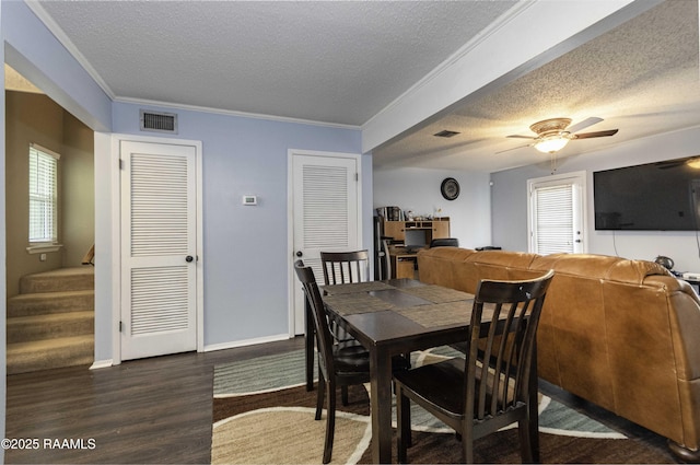 16 Heather Row, Lafayette, LA 70507 - dining area featuring a textured ceiling, wood finished floors, stairway, ceiling fan, and crown molding