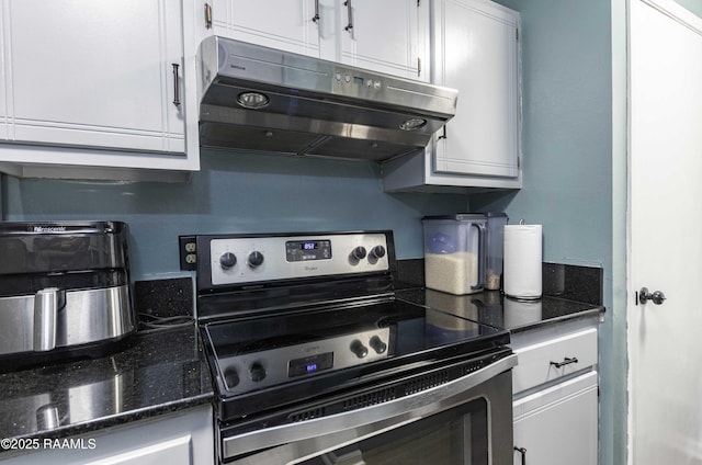 16 Heather Row, Lafayette, LA 70507 - kitchen featuring stainless steel range with electric cooktop, extractor fan, white cabinets, and dark stone countertops
