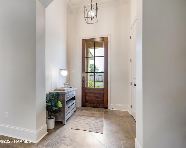 203 Sanctuary Ln, Lafayette, LA 70503 - foyer featuring baseboards, a chandelier, and ornamental molding