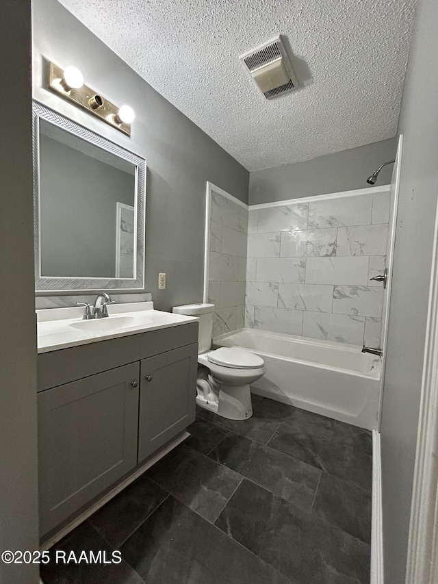 106 Dove Cir, Lafayette, LA 70508 - bathroom with a textured ceiling, vanity, toilet, shower / washtub combination, and marble look tile flooring