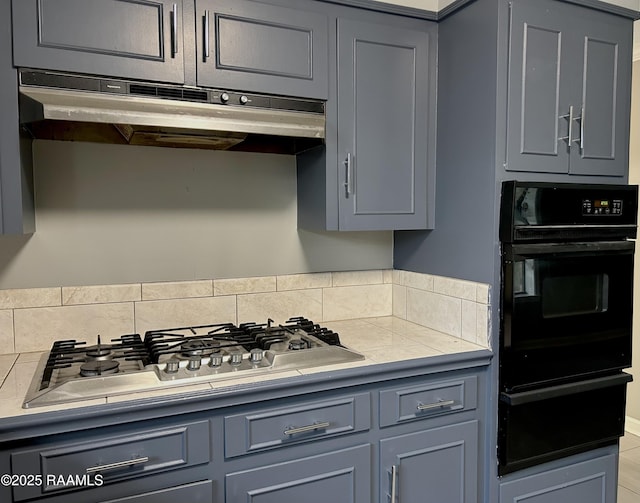 106 Dove Cir, Lafayette, LA 70508 - kitchen with black oven, a warming drawer, stainless steel gas cooktop, and gray cabinets