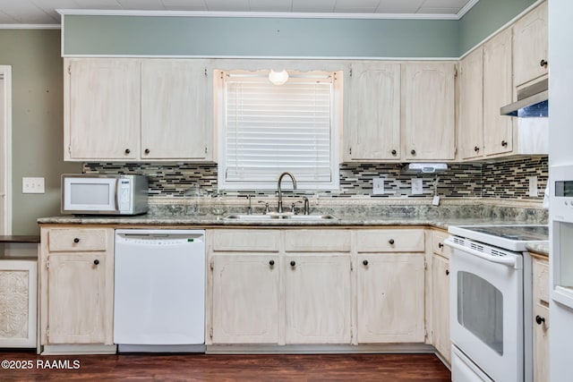 231 La Compagne St, Opelousas, LA 70570 - kitchen featuring white appliances, a sink, under cabinet range hood, crown molding, and backsplash