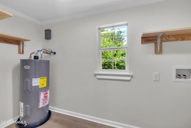630 Ledoux St, Jennings, LA 70546 - utility room featuring electric water heater
