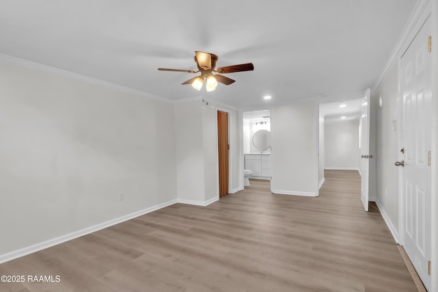 630 Ledoux St, Jennings, LA 70546 - empty room featuring a ceiling fan, recessed lighting, light wood-style flooring, baseboards, and crown molding