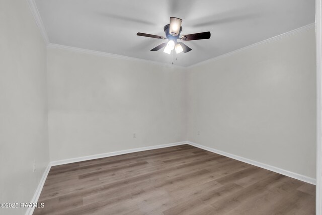 630 Ledoux St, Jennings, LA 70546 - unfurnished room featuring a ceiling fan, wood finished floors, ornamental molding, and baseboards
