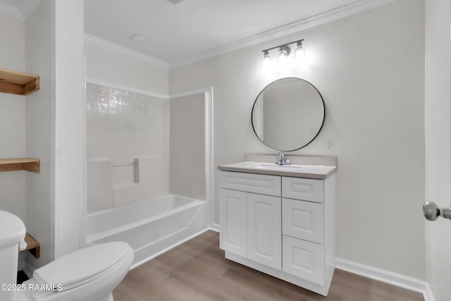 630 Ledoux St, Jennings, LA 70546 - bathroom with wood finished floors, toilet, crown molding, vanity, and baseboards