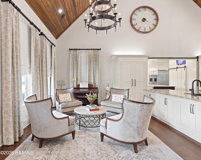235 N Fieldspan Rd, Scott, LA 70583 - living area featuring wooden ceiling, high vaulted ceiling, a chandelier, dark wood finished floors, and recessed lighting