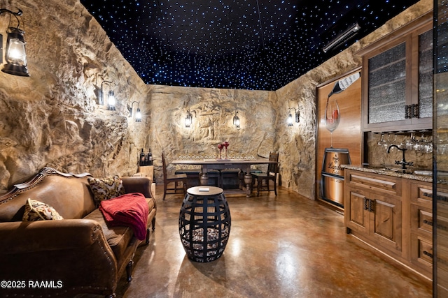235 N Fieldspan Rd, Scott, LA 70583 - cinema with finished concrete floors and bar area