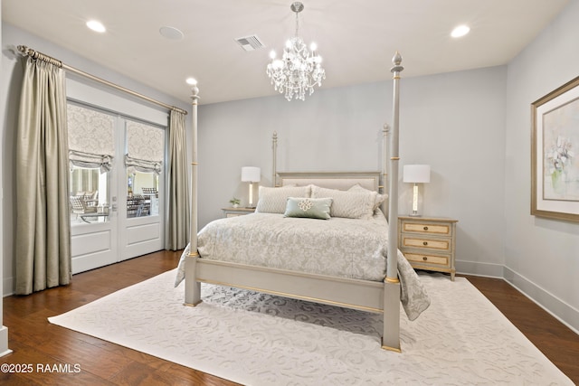 235 N Fieldspan Rd, Scott, LA 70583 - bedroom with access to outside, baseboards, recessed lighting, a chandelier, and dark wood-style flooring