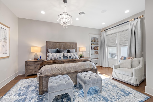 235 N Fieldspan Rd, Scott, LA 70583 - bedroom featuring a chandelier, wood finished floors, recessed lighting, and baseboards