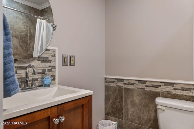 421 Karen Dr, Lafayette, LA 70503 - bathroom featuring vanity, tile walls, toilet, ornamental molding, and a shower with shower curtain