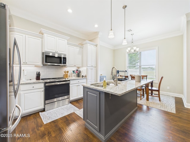 120 Old Heritage Ln, Carencro, LA 70520 - kitchen featuring stainless steel appliances, a sink, decorative backsplash, dark wood-style floors, and recessed lighting