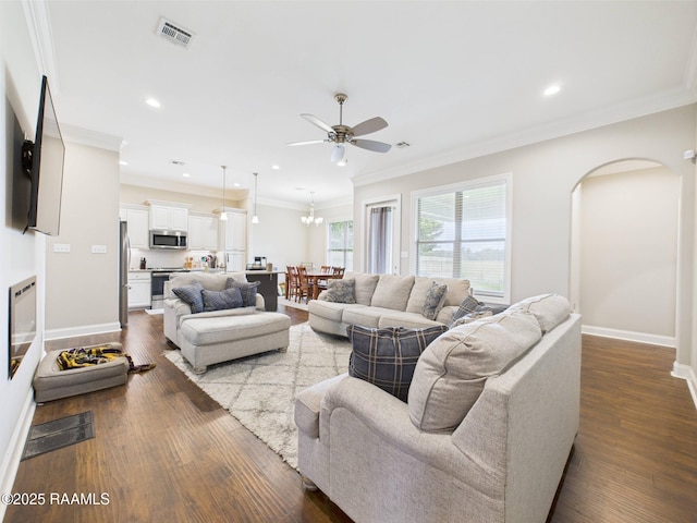 120 Old Heritage Ln, Carencro, LA 70520 - living area featuring ceiling fan, dark wood-type flooring, arched walkways, baseboards, and recessed lighting