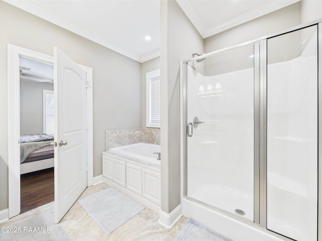 120 Old Heritage Ln, Carencro, LA 70520 - ensuite bathroom with ornamental molding, a garden tub, a shower stall, and baseboards