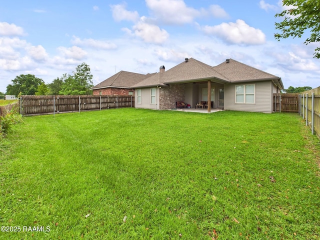 120 Old Heritage Ln, Carencro, LA 70520 - back of property with a patio area