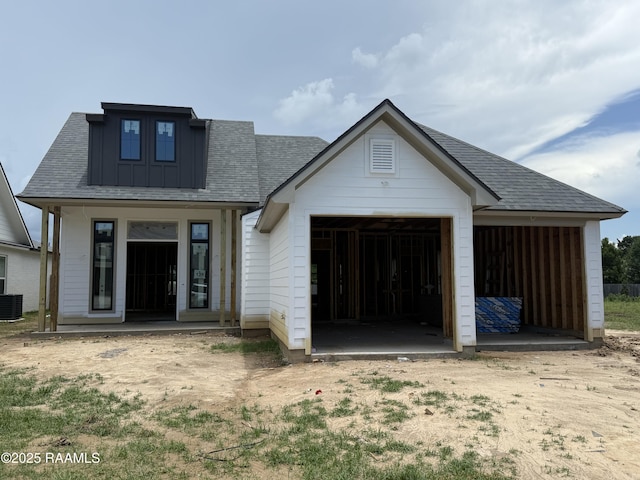 139 Lakes Edge Dr, Broussard, LA 70518 - view of front of home featuring board and batten siding, a garage, and a shingled roof