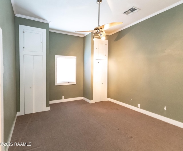 306 Oak St, Iota, LA 70543 - unfurnished bedroom with dark colored carpet, ornamental molding, and baseboards