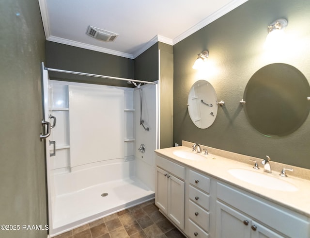 306 Oak St, Iota, LA 70543 - bathroom featuring ornamental molding, double vanity, and a shower