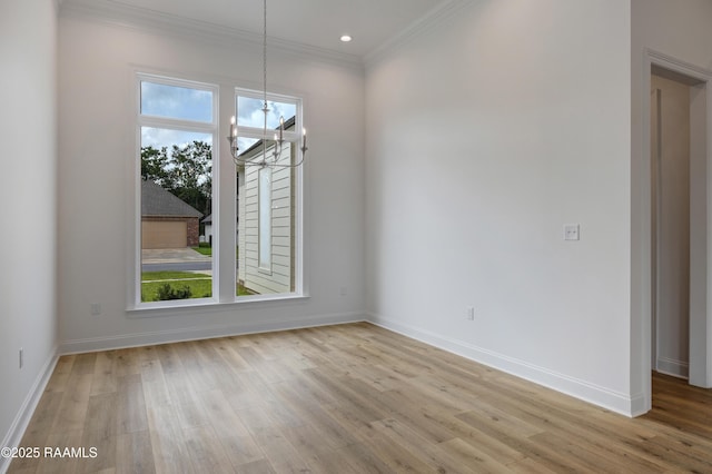 203 Redfern St, Lafayette, LA 70508 - unfurnished dining area featuring ornamental molding, light wood-type flooring, a chandelier, and recessed lighting