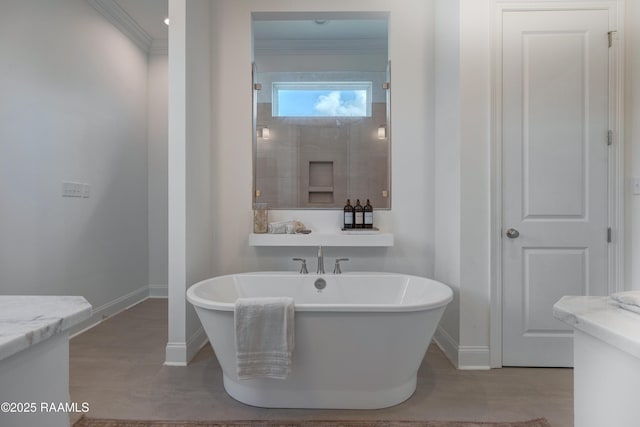 203 Redfern St, Lafayette, LA 70508 - full bathroom with a soaking tub, crown molding, and wood finished floors