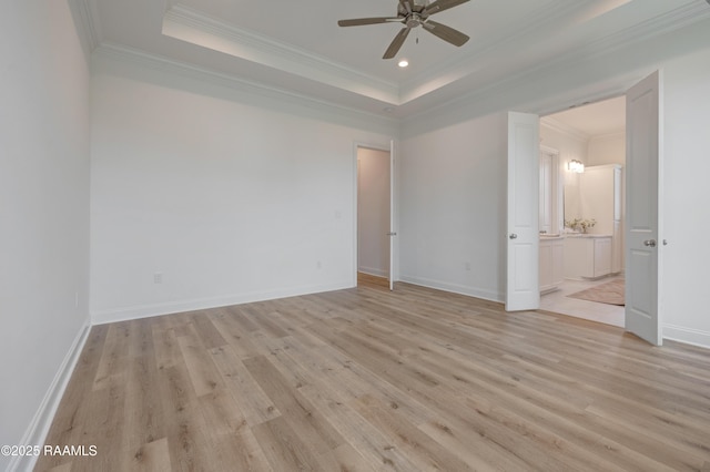 203 Redfern St, Lafayette, LA 70508 - empty room featuring ceiling fan, light wood-style flooring, a tray ceiling, crown molding, and recessed lighting