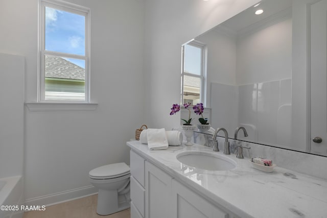 203 Redfern St, Lafayette, LA 70508 - bathroom with vanity, crown molding, and a bath