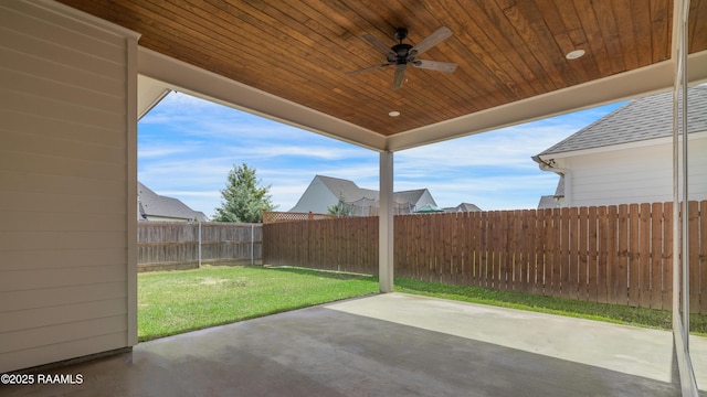 203 Redfern St, Lafayette, LA 70508 - fenced backyard featuring a ceiling fan and a patio area