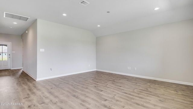 316 White Pine Dr, Lafayette, LA 70501 - spare room featuring wood finished floors, baseboards, and recessed lighting