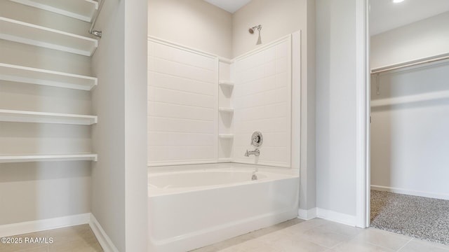 316 White Pine Dr, Lafayette, LA 70501 - bathroom featuring shower / washtub combination, tile patterned floors, baseboards, and a spacious closet