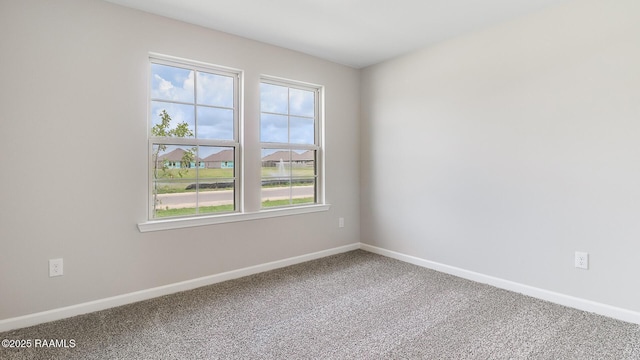 316 White Pine Dr, Lafayette, LA 70501 - carpeted empty room with plenty of natural light and baseboards
