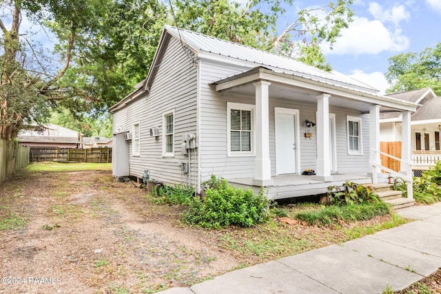 312 Hobson St, Lafayette, LA 70501 - view of front facade with a porch and metal roof