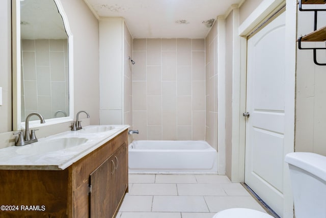 312 Hobson St, Lafayette, LA 70501 - full bathroom featuring toilet, tile patterned flooring, shower / bath combination, and double vanity