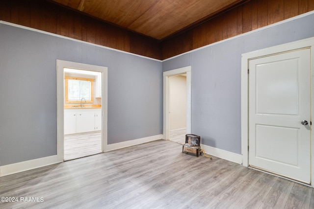 312 Hobson St, Lafayette, LA 70501 - spare room featuring wooden ceiling, a sink, wood finished floors, and baseboards